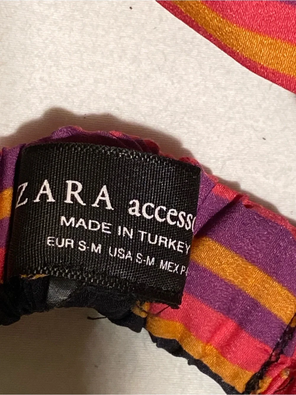 Zara Pink Striped Twisted Headband with Multicolor Accents